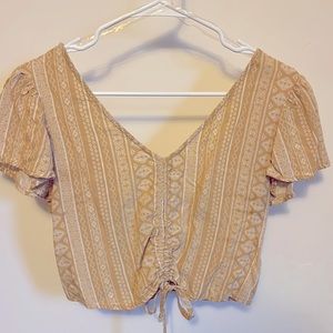 Yellow crop top size L. Live to be spoiled